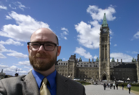 Mike Toye in front of the Canadian parliament
