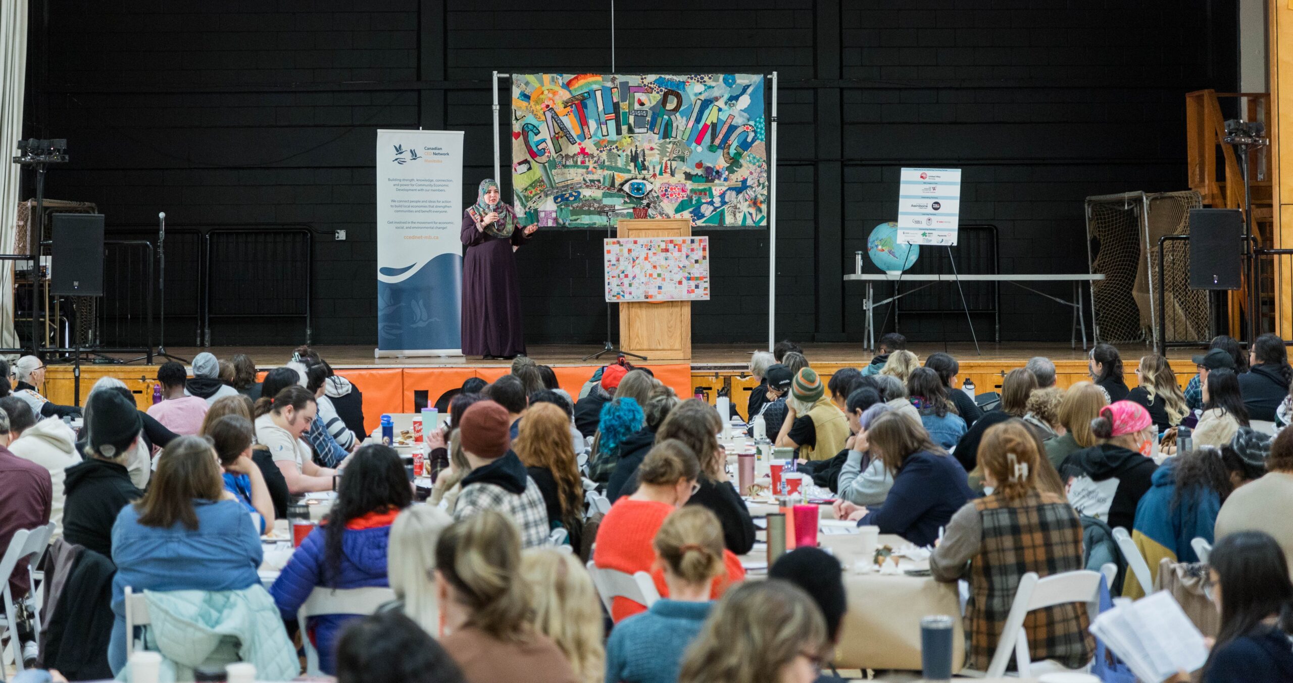 The Gathering 2025 at St. John's High School - participants in gym
